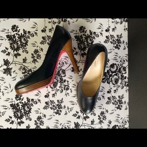 Oh Deer! brand red bottom heels.